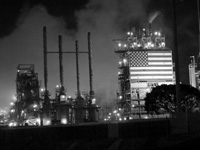 bw night shot of a refinery